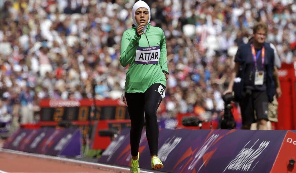 Saudi Arabia's Sarah Attar competes in a women's 800-meter heat during the athletics in the Olympic Stadium at the 2012 Summer Olympics, London.