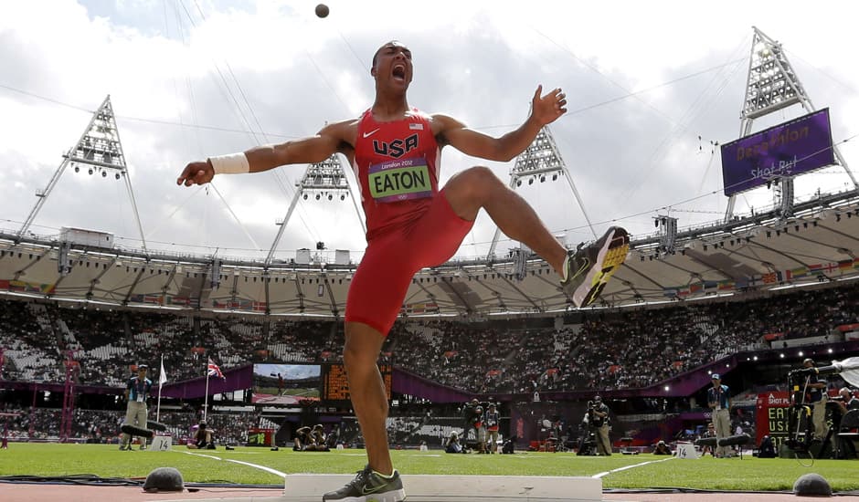 United States' Ashton Eaton reacts after his throw in the shot put in the decathlon during the athletics in the Olympic Stadium at the 2012 Summer Olympics, London.