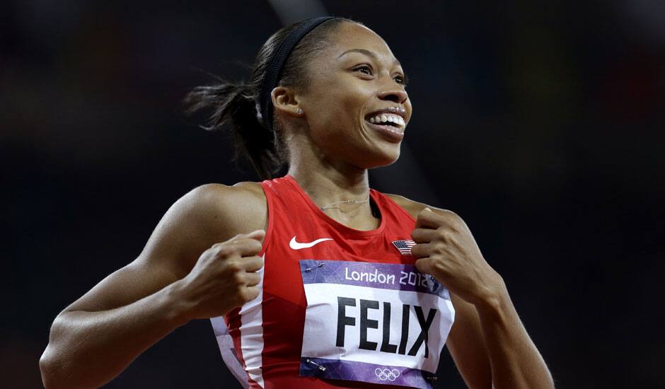 United States' Allyson Felix celebrates her win in the women's 200-meter final during the athletics in the Olympic Stadium at the 2012 Summer Olympics.