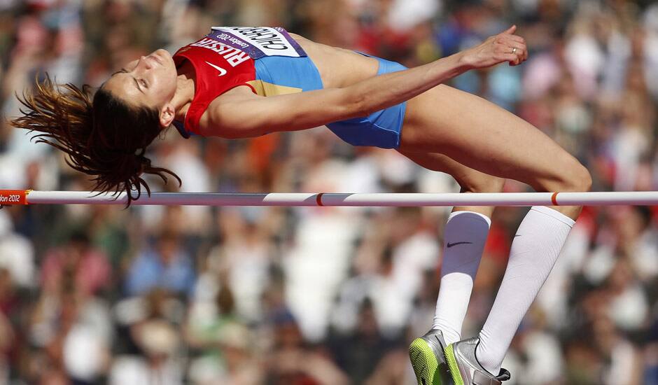 Russia's Anna Chicherova competes in a women's high jump qualification round during the athletics in the Olympic Stadium at the 2012 Summer Olympics, London.