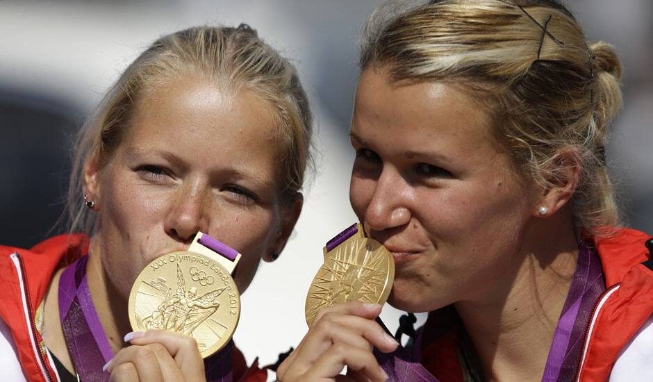 Germany's Frnaziska Weber, and Tina Dietze pose with the gold medals then won in the women's kayak double 500m in Eton Dorney, near Windsor, England, at the 2012 Summer Olympics.