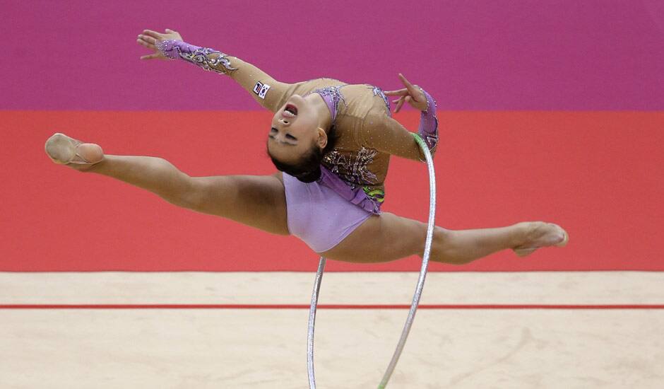 South Korea's Son Yeon-jae performs during the rhythmic gymnastics individual all-around qualifications at at the 2012 Summer Olympics, in London.