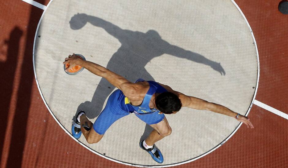 The Ukraine's Oleksiy Kasyanov competes in the men's decathlon discus throw event at the London 2012 Olympic Games at the Olympic Stadium, in London.