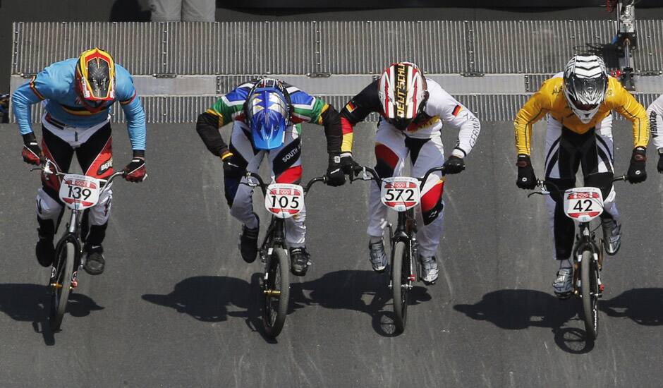 Cyclists compete in a BMX cycling men's quarterfinal run during the 2012 Summer Olympics in London.