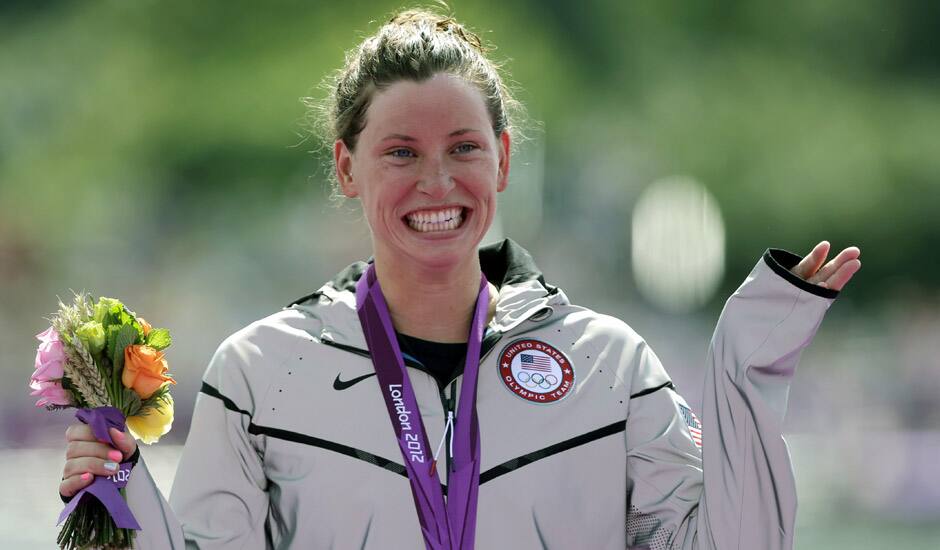 Silver medalist Haley Anderson of the United States reacts during a medals ceremony after the women's 10-kilometer marathon swimming competition at Hyde Park at the 2012 Summer Olympics, in London.