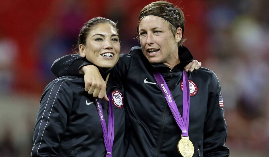 United States' Abby Wambach, right, and teammate Hope Solo celebrate winning the gold medal during in the women's soccer final against Japan at the 2012 Summer Olympics.