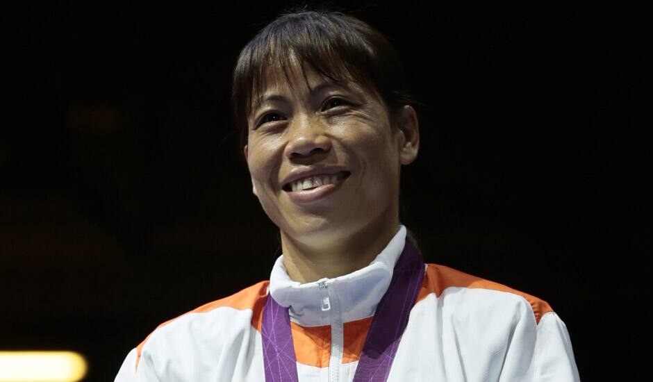 Bronze medalist, Mery Kom Hmangte, participates in the medals ceremony for women's final flyweight 51-kg gold medal boxing match at the 2012 Summer Olympics in London. 