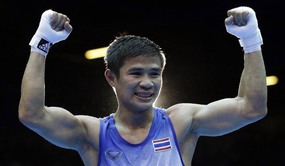 Thailand's Kaeo Pongprayoon reacts after beating Russia's David Ayrapetyan in their light flyweight 49-kg semifinal boxing match at the 2012 Summer Olympics in London.