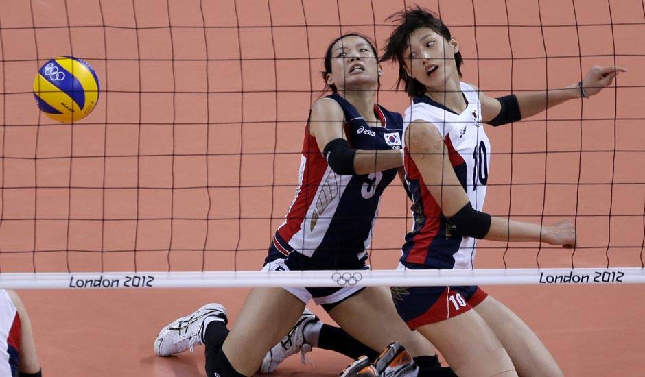 South Korea's Kim Hae-ran, left, and teammate Kim Yeon-koung watch as a ball fall to the court during a women's bronze medal volleyball match against Japan at the 2012 Summer Olympics.