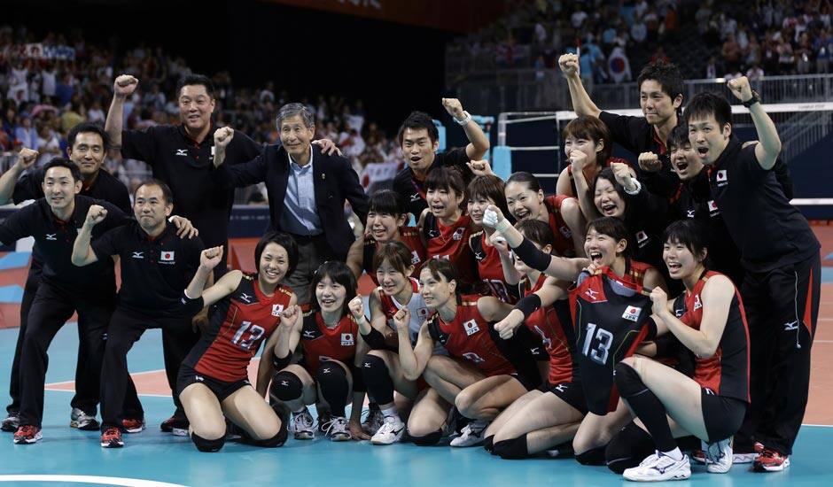 Japan poses for a photo after the team defeated South Korea during a women's volleyball bronze medal match at the 2012 Summer Olympics.