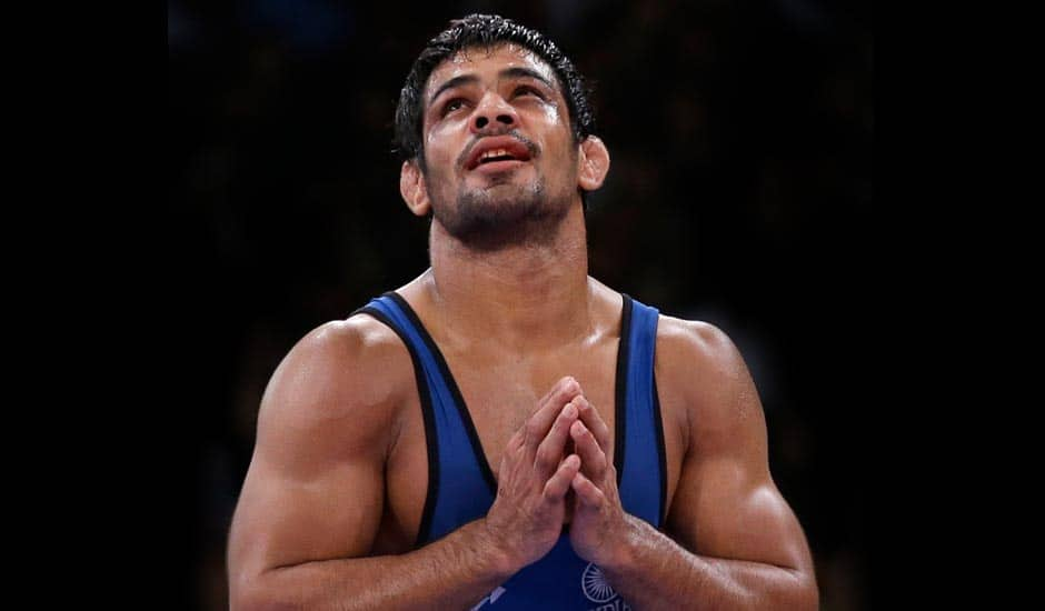 Sushil Kumar reacts after his match against Akzhurek Tanatarov of Kazakhstan in their 66-kg freestyle wrestling match at the 2012 Summer Olympics.