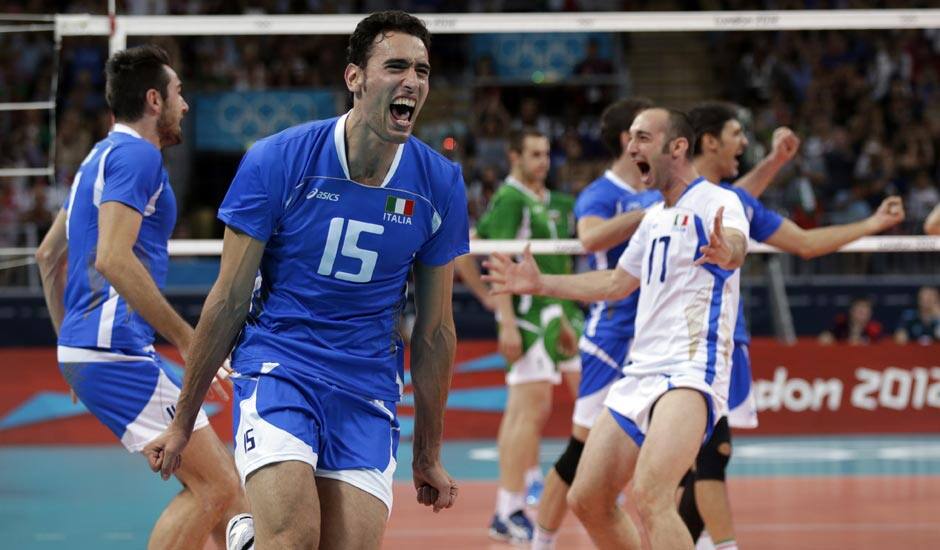 Italy's Emanuele Birarelli (15) and Andrea Giovi (17) react following the final point of a 3-1 win over Bulgaria in the men's bronze medal volleyball match at the 2012 Summer Olympics.