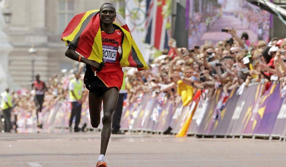 Wilson Kipsang Kiprotich of Uganda approaches the finish line to win the men's marathon at the 2012 Summer Olympics in London.