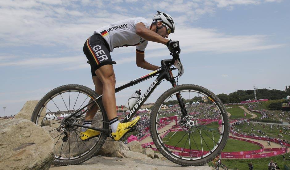 Germany's Manuel Fumic competes in the Mountain Bike Cycling men's race, at the 2012 Summer Olympics.