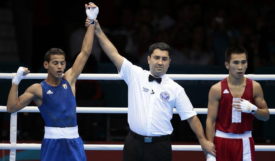 Cuba's Robeisy Ramirez Carrazana reacts after being declared the winner over Mongolia's Tugstsogt Nyambayar in their flyweight 52-kg gold medal boxing match at the 2012 Summer Olympics.