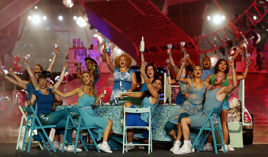 Performers cheer during the Closing Ceremony at the 2012 Summer Olympics, Sunday, Aug. 12, 2012, in London. 