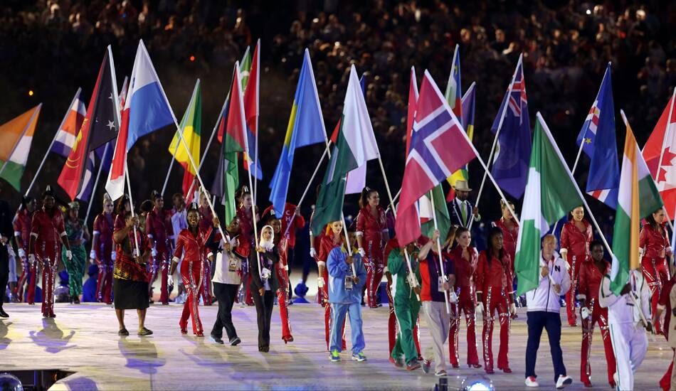 Flag bearers march in Olympic Stadium during the Closing Ceremony at the 2012 Summer Olympics, Sunday, Aug. 12, 2012, in London.