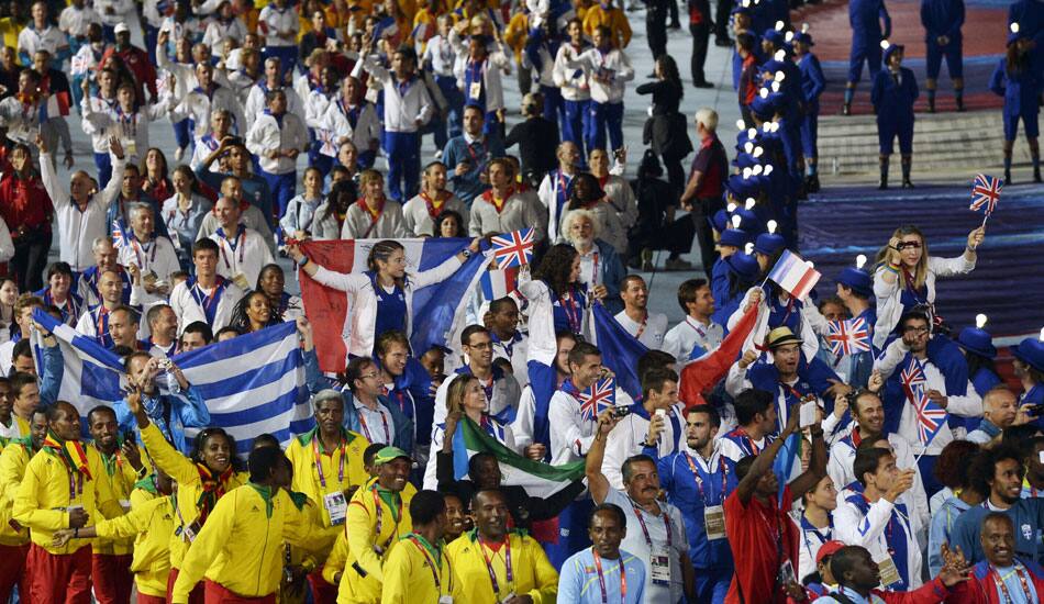 Athletes arrive during the Closing Ceremony at the 2012 Summer Olympics, Sunday, Aug. 12, 2012, in London.