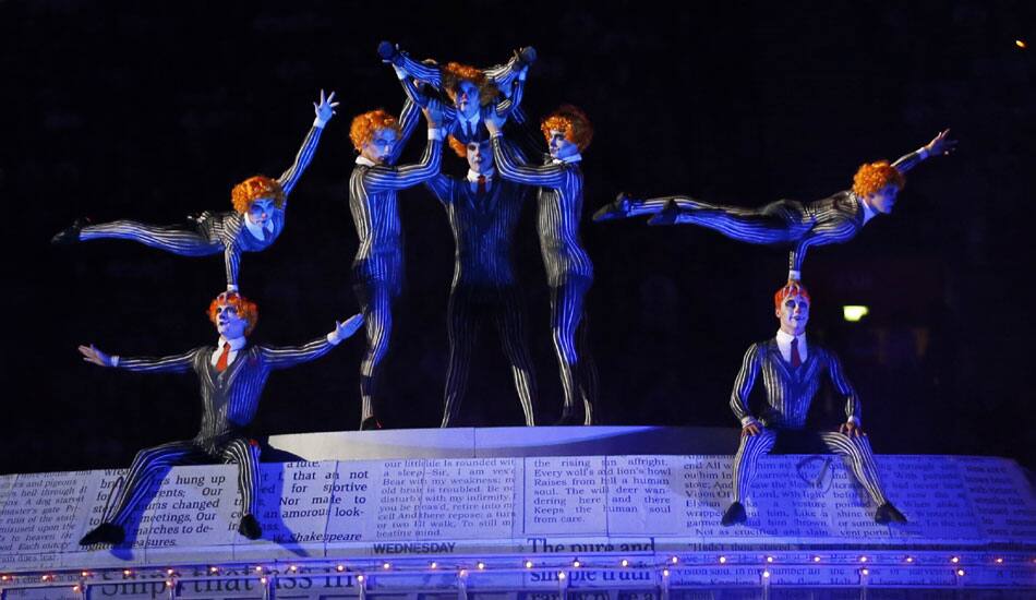 Acrobats perform on stage during the Closing Ceremony at the 2012 Summer Olympics, Sunday, Aug. 12, 2012, in London.