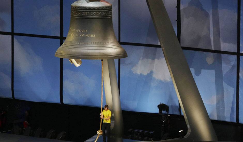 Tour de France champion Bradley Wiggins ring a bell during the Opening Ceremony at the 2012 Summer Olympics in London.