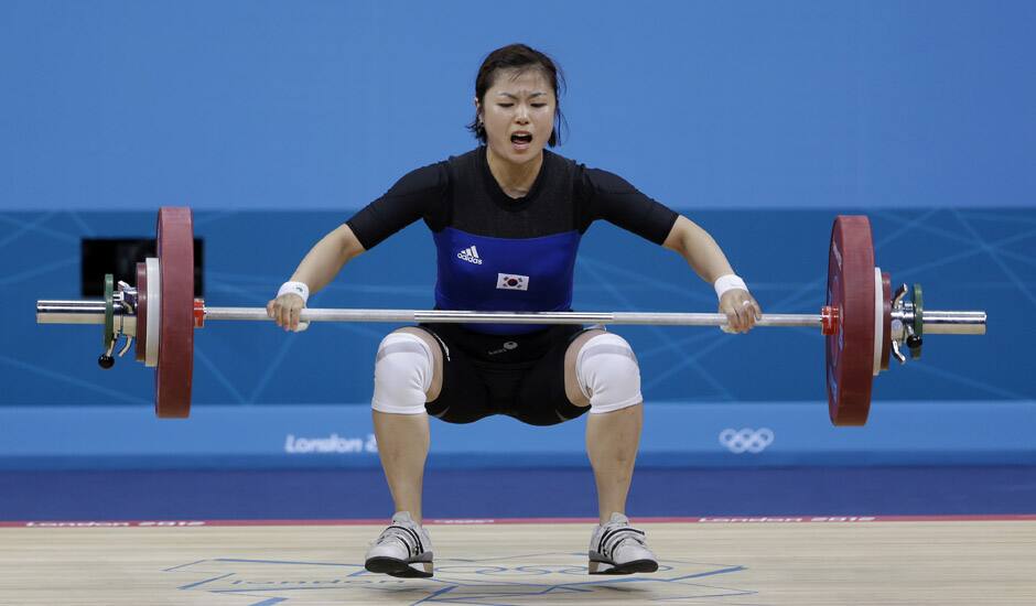 Yang Eun-Hye of South Korea competes during the women's 58-kg weightlifting competition at the 2012 Summer Olympics, Monday, July 30, 2012, in London.Yang Eun-Hye of South Korea competes during the women's 58-kg weightlifting competition at the 2012 Summer Olympics in London.