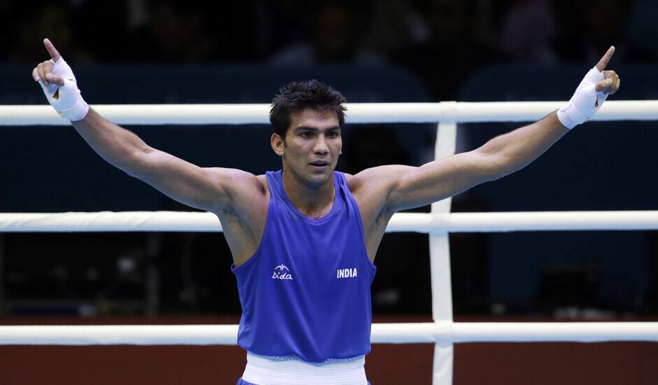 India's Kumar Manoj reacts after defeating Turkmenistan's Serdar Hudayberdiyev in a light welter 64-kg boxing match at the 2012 Summer Olympics in London.