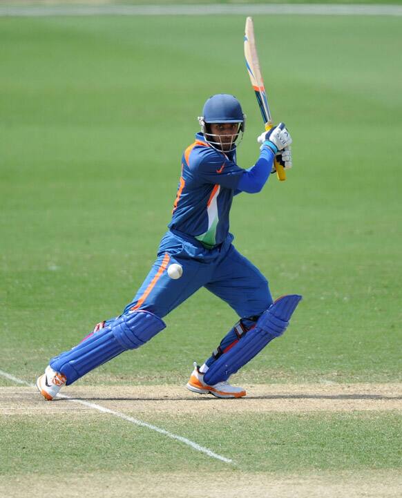 Hanuma Vihari of India cuts the ball against New Zealand during their ICC U19 Cricket World Cup 2012 semi-final match in Townsville, Australia. 