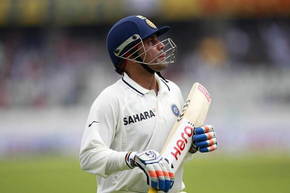 Virender Sehwag reacts after being dismissed during the first day of the first cricket test match against New Zealand in Hyderabad.