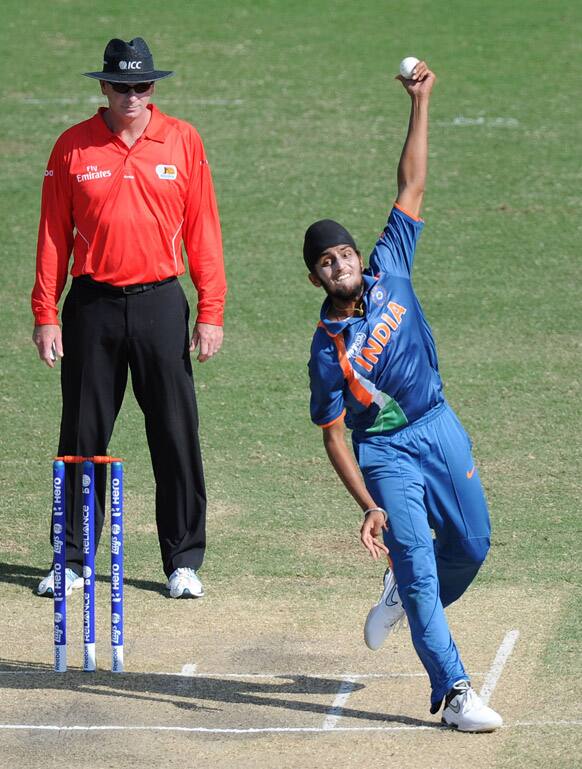  Ravi Kant Singh, bowls against New Zealand during their ICC U19 Cricket World Cup 2012 semi-final match, in Townsville, Australia.