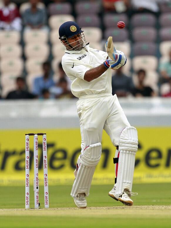 Mahendra Singh Dhoni bats during the second day of the first cricket test match against New Zealand in Hyderabad.