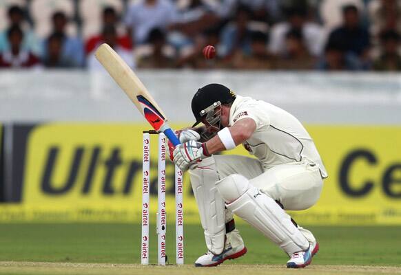 Brendon McCullum ducks to avoid a delivery during the second day of the first cricket test match against India in Hyderabad.