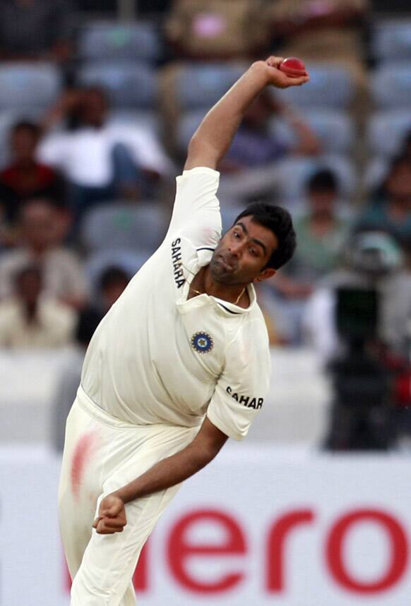 Ravichandran Ashwin bowls during the second day of the first cricket test match against New Zealand in Hyderabad.