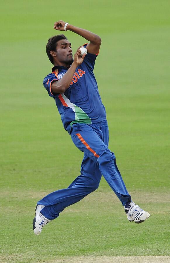 Sandeep Sharma bowls to Australia during the 2012 ICC under-19 Cricket World Cup final Sunday, Aug. 26, 2012, in Townsville, Australia..