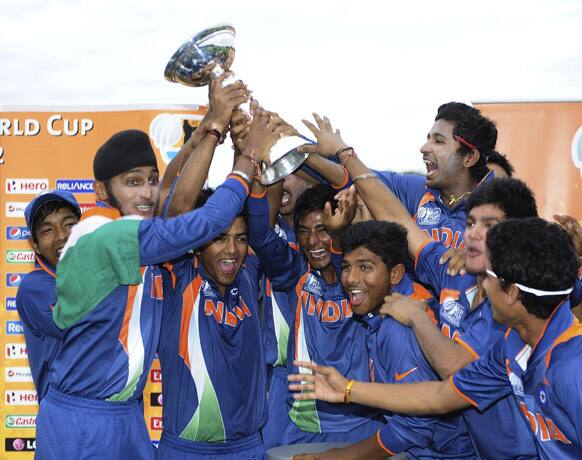 Indian players celebrate their victory over Australia in the the 2012 ICC U19 Cricket World Cup final in Townsville, Australia.