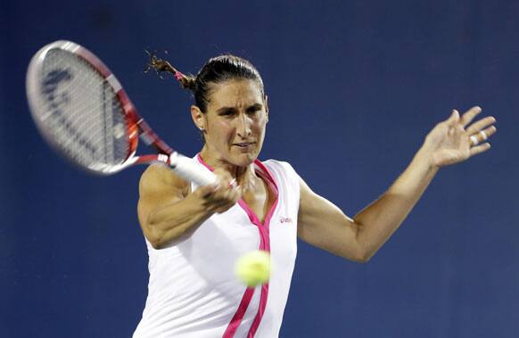 Virginie Razzano, of France, returns a shot to Zheng Jie, of China, during a match at the U.S. Open tennis tournament in New York. Jie won 4-6, 6-2. 