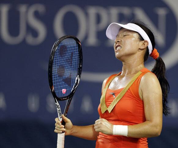 Zheng Jie, of China, reacts during her match against Virginie Razzano, of France, at the U.S. Open tennis tournament in New York. Jie won 4-6, 6-2. 