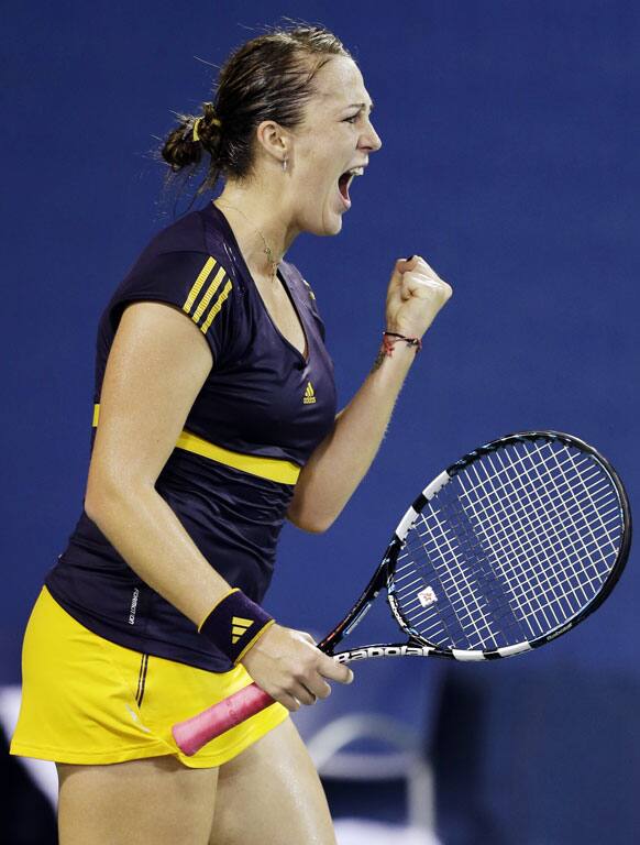 Anastasia Pavlyuchenkova, of Russia, reacts after breaking the serve of Daniela Hantuchova, of Slovakia, during a match at the U.S. Open tennis tournament in New York. 