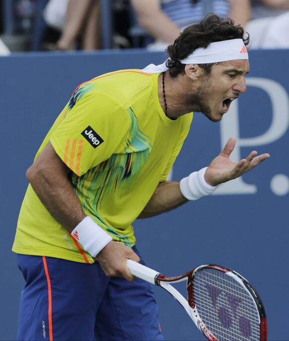 Juan Monaco of Argentina reacts during his match against Spain's Guillermo Garcia-Lopez in the first round of play at the 2012 US Open tennis tournament.