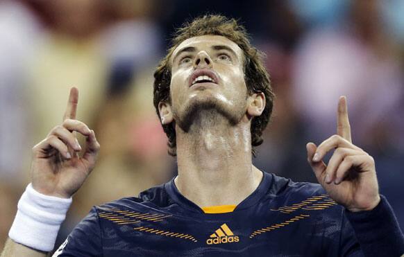 Andy Murray, of Britain, celebrates his 6-2, 6-1, 6-3, win over Ivan Dodig, of Croatia, in the second round of play at the US Open tennis tournament.