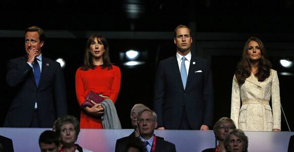 Britain's Prince William and wife Kate, the Duke and Duchess of Cambridge and Britain's Prime Minister David Cameron and his wife Samantha attend the Opening Ceremony for the 2012 Paralympics in London.