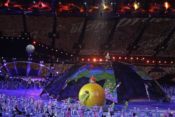 Performers throng the arena during the Opening Ceremony for the 2012 Paralympics in London.