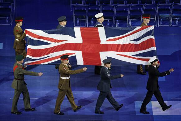 The Union flag is carried into the arena during the Opening Ceremony for the 2012 Paralympics in London.