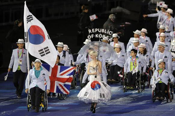 South Korea's flagbearer weelchair marathonian Gyu Dae Kim during the Opening Ceremony for the 2012 Paralympics in London.