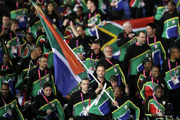 South Africa's flagbearer runner Oscar Pistorius leads his team during the Opening Ceremony for the 2012 Paralympics in London.