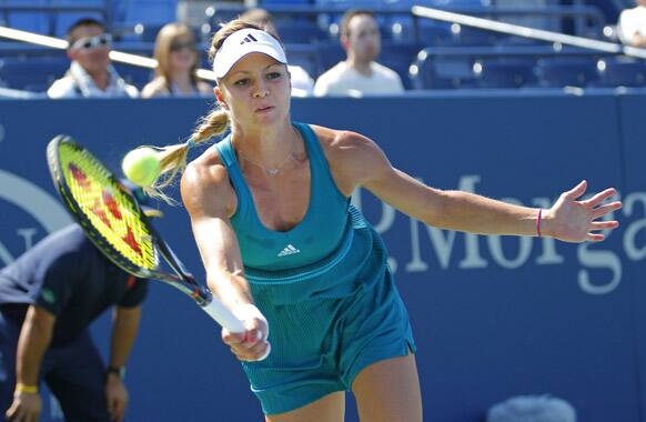 Russia's Maria Kirilenko returns a shot to Greta Arn, of Hungary, in the second round of play at the 2012 US Open tennis tournament.