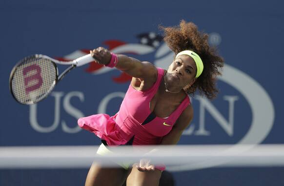 Serena Williams serves to Spain's Maria Jose Martinez Sanchez in the second round of play at the 2012 US Open tennis tournament.