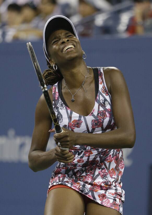 Venus Williams reacts during a match against Angelique Kerber, of Germany, at the U.S. Open tennis tournament in New York.