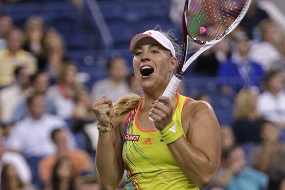 Angelique Kerber, of Germany, reacts after beating Venus Williams 6-2, 5-7, 7-5 in the second round of play at the 2012 US Open tennis tournament in New York.