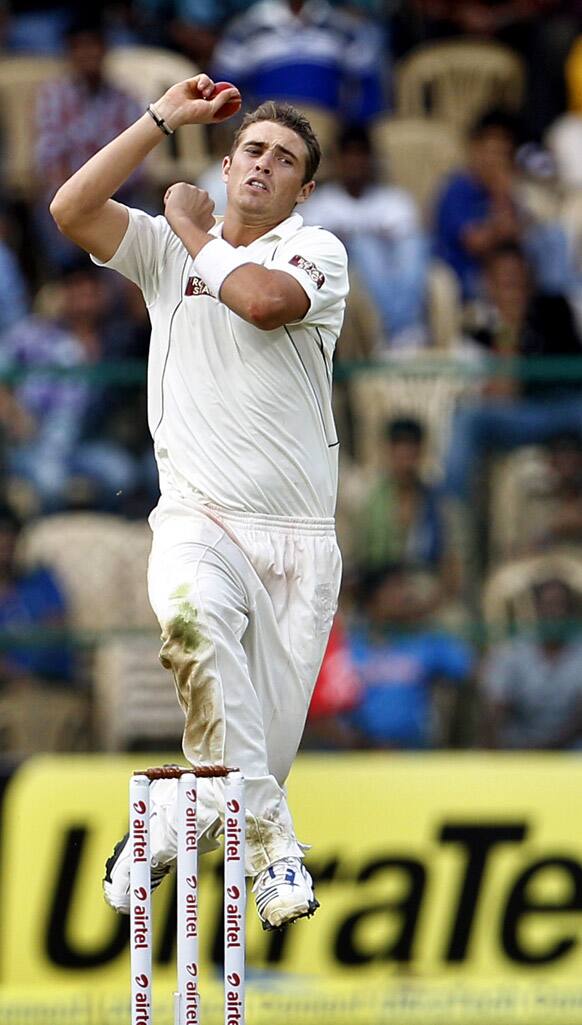 New Zealand bowler Tim Southee bowls a delivery during the second day of their second cricket test match against India in Bangalore.