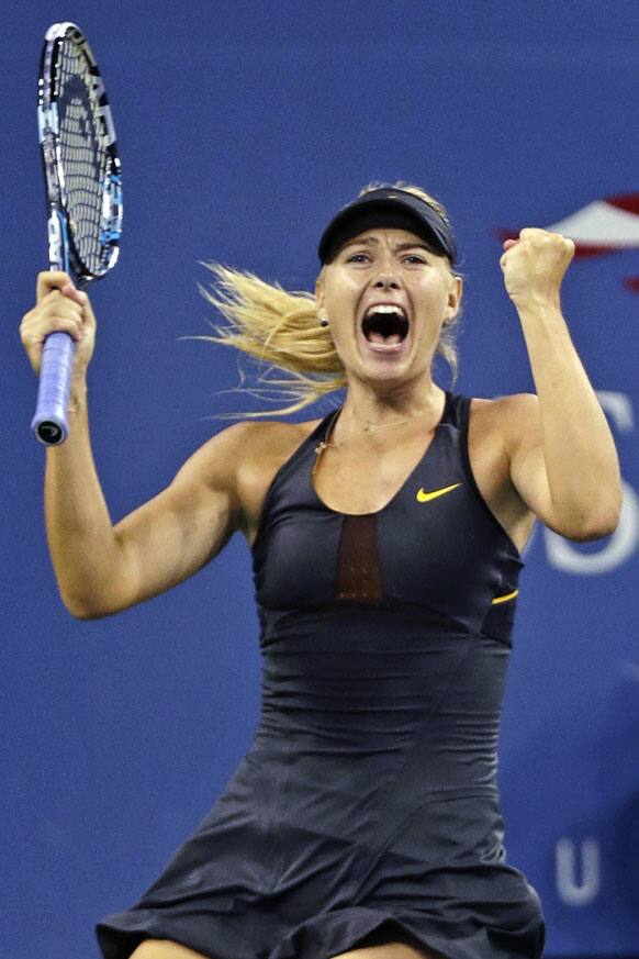 Maria Sharapova, of Russia, reacts after defeating Nadia Petrova, of Russia, 6-1, 4-6, 6-4 in the fourth round of play at the US Open tennis tournament.